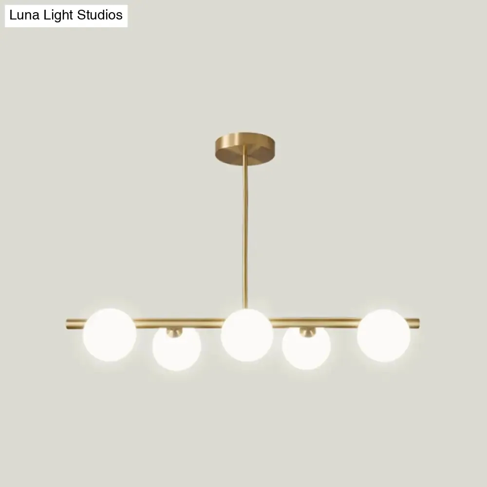 Gold Linear Island Pendant Light with Spherical Glass Shade - Perfect for Dining Table and Minimalist Decor