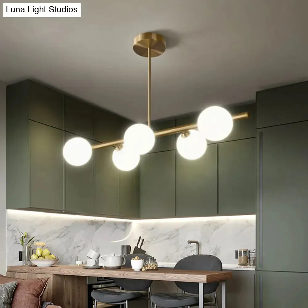 Gold Linear Island Pendant Light with Spherical Glass Shade - Perfect for Dining Table and Minimalist Decor